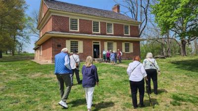 Visitors arrive at Primitive Hall