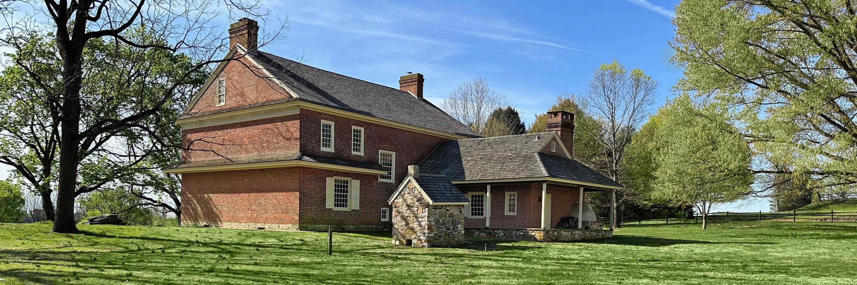 Primitive Hall with Kitchen and Smokehouse